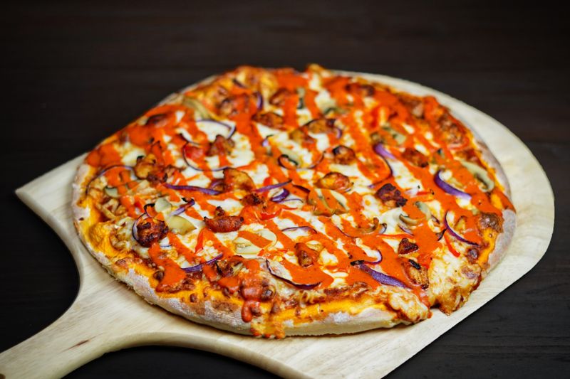 Dewey's White Truffle pizza with mushrooms and creamy sauce