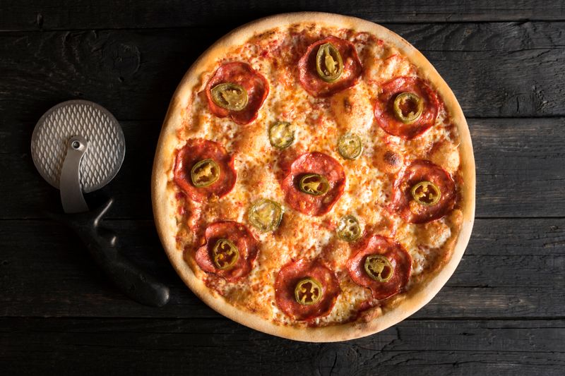 Dewey's Pepperoni Feast pizza loaded with premium pepperoni